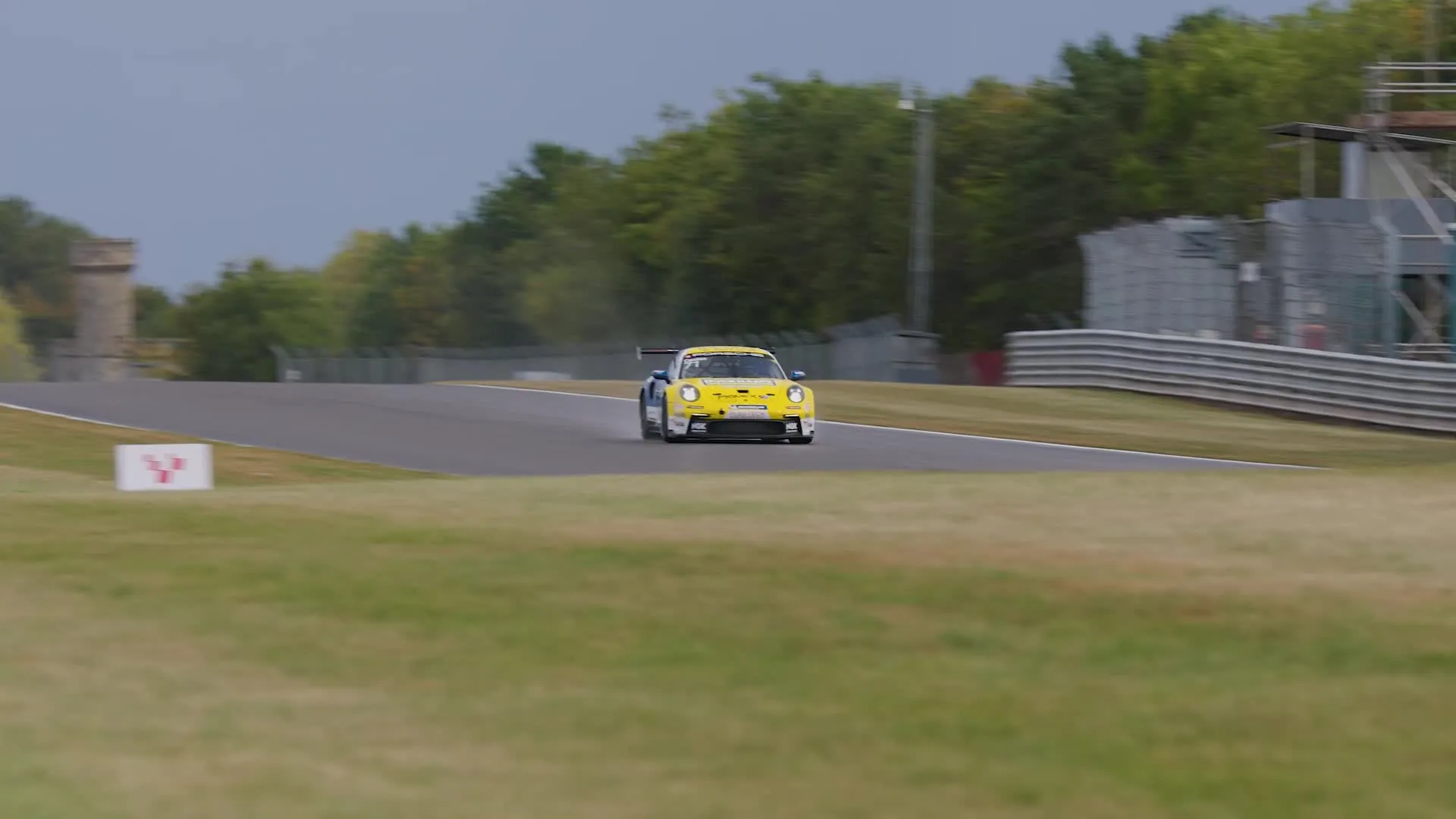 The number 27 Duckhams Yuasa Racing Porsche at speed.